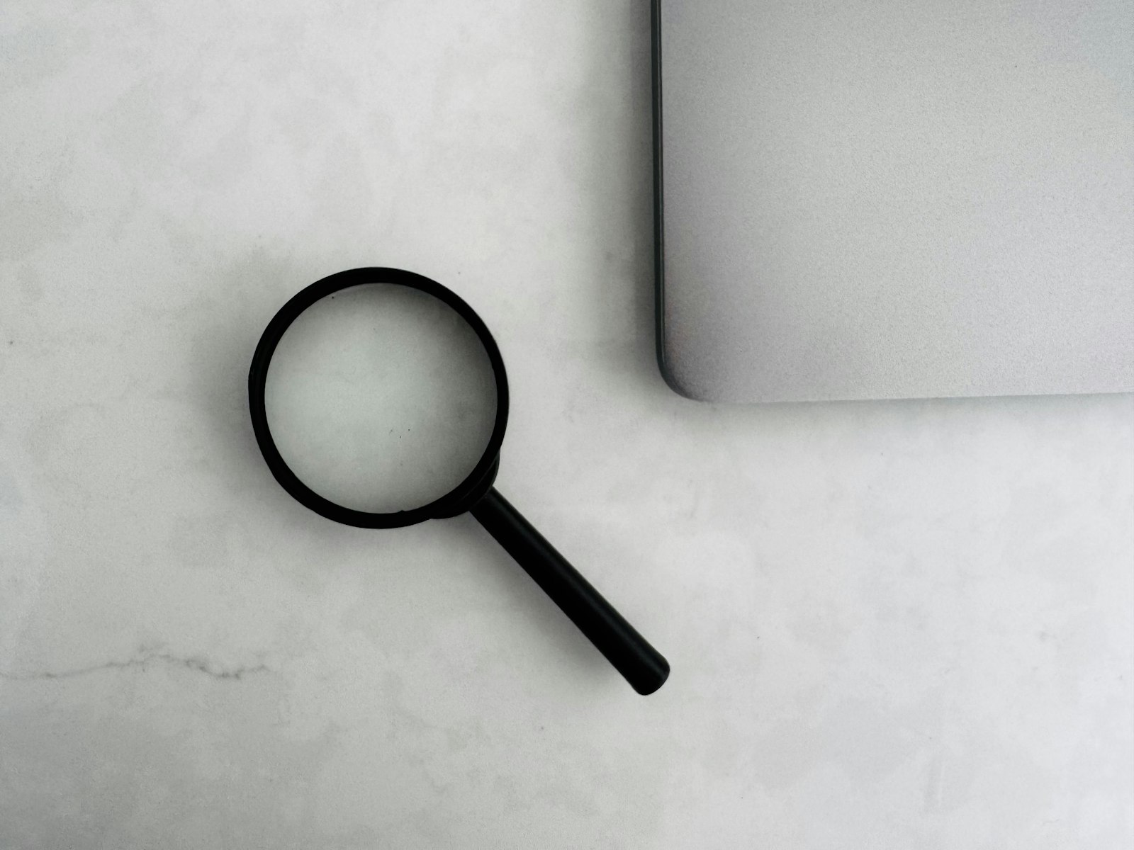 Writer reviewing an AI detector report on a laptop